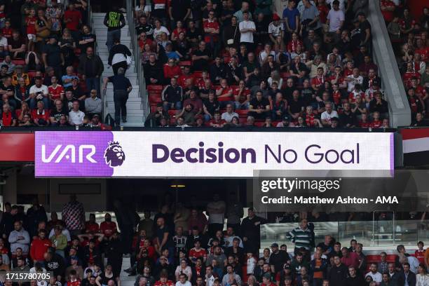 The VAR logo on the LED screen displaying no goal during the Premier League match between Manchester United and Brentford FC at Old Trafford on...