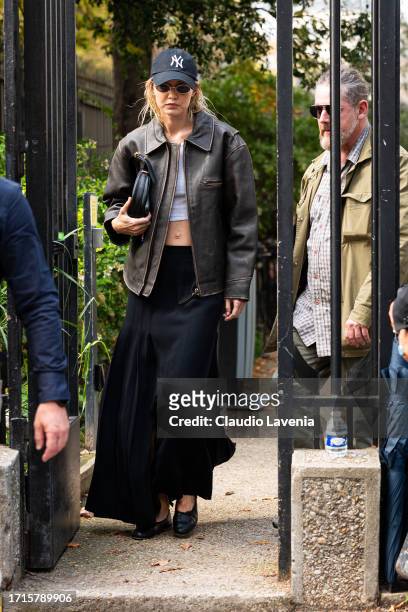 Gigi Hadid is seen outside Miu Miu fashion show during the Womenswear Spring/Summer 2024 as part of Paris Fashion Week on October 03, 2023 in Paris,...