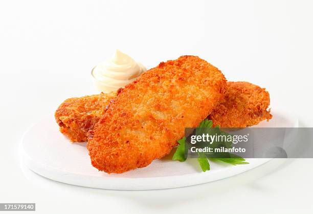 fried fish fillets - breaded stock pictures, royalty-free photos & images