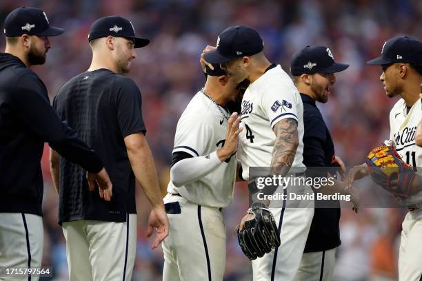 Carlos Correa and Royce Lewis of the Minnesota Twins celebrate after defeating the Toronto Blue Jays in Game One of the Wild Card Series at Target...