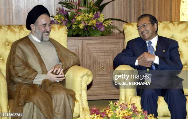 Malaysian Prime Minister Mahathir Mohamad meets with Iranian President Mohammad Khatami on the sidlelines of of the 10th summit of the Organization...