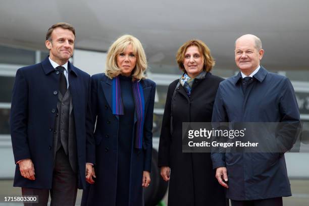French President Emmanuel Macron , his wife Brigitte Macron, the wife of German chancellor Britta Ernst and German chancellor Olaf Scholz arriving by...