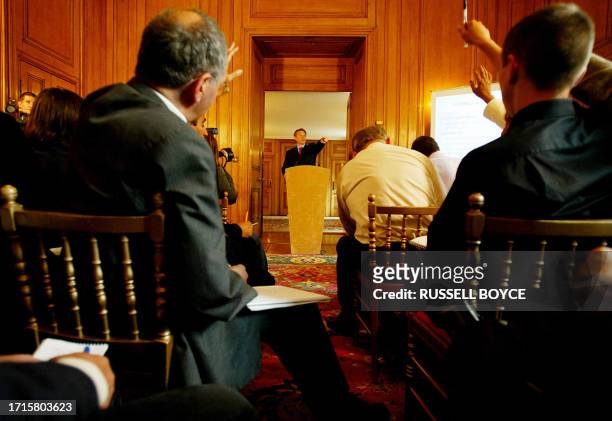 Britain's Prime Minister Tony Blair takes questions during his monthly televised news conference in Downing Street in London, 30 July, 2003. Blair,...