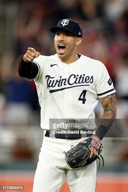 Carlos Correa of the Minnesota Twins celebrates the final out against the Toronto Blue Jays to win Game One of the Wild Card Series at Target Field...