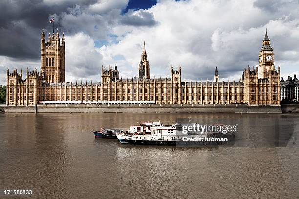 houses of parliament in london - house of commons stock pictures, royalty-free photos & images