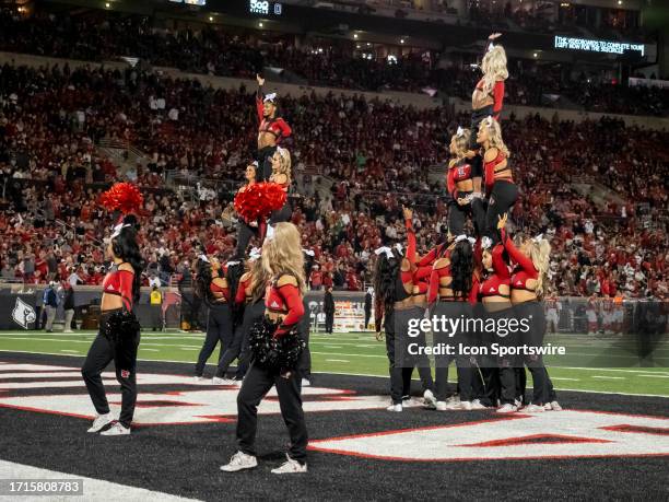 The Louisville Cardinals dance team performs during the college football game between the Notre Dame Fighting Irish and the Louisville Cardinals on...