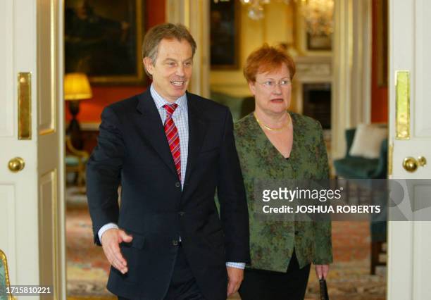 British Prime Minister Tony Blair walks with Finnish President Tarja Halonen during her visit to No. 10 Downing Street 11 May, 2004. AFP PHOTO/JOSHUA...