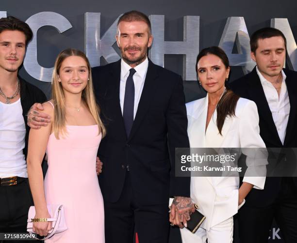 Harper Beckham, David Beckham and Victoria Beckham attend the Netflix 'Beckham' UK Premiere at The Curzon Mayfair on October 03, 2023 in London,...