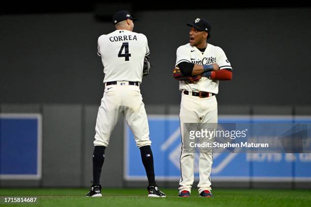 Carlos Correa and Jorge Polanco of the Minnesota Twins celebrate after defeating the Toronto Blue Jays in Game One of the Wild Card Series at Target...