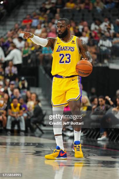 LeBron James of the Los Angeles Lakers handles the ball during the game against the Brooklyn Nets on October 9, 2023 at T-Mobile Arena in Las Vegas,...