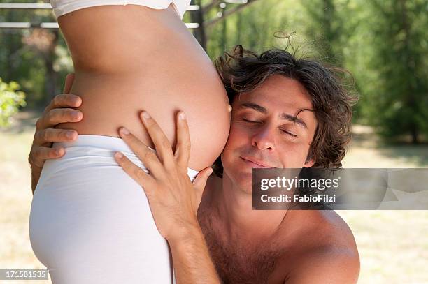 paternal tenderness - fabio filzi stock pictures, royalty-free photos & images