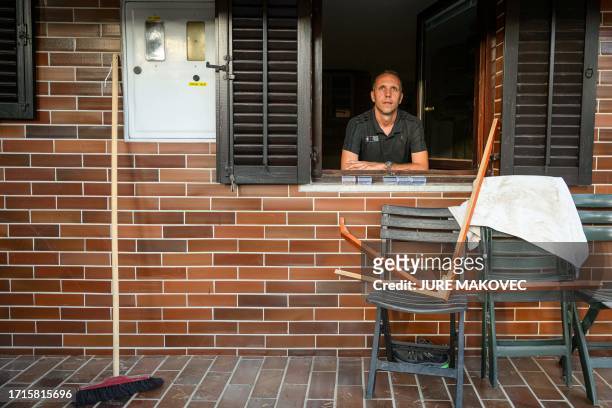 Bojan Arcan poses for a photo in Recica ob Paki, Slovenia on September 19 after heavy floods hit Slovenia in the beginning of August. After floods...
