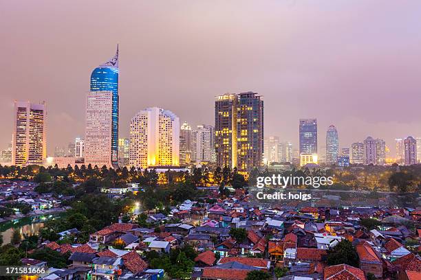 jakarta by night, indonesia - jakarta slum stock pictures, royalty-free photos & images