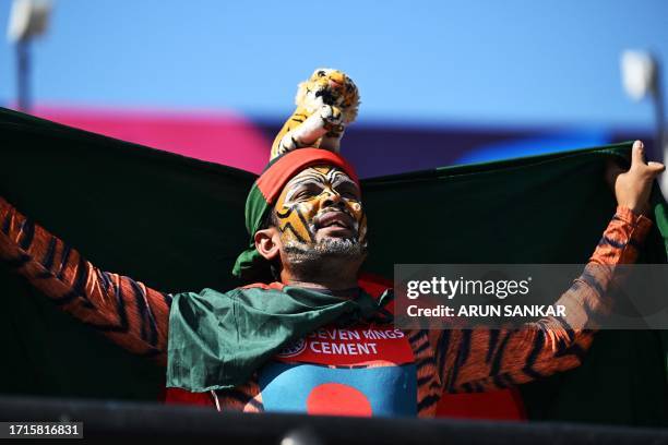 Supporter of Bangladesh cheers before the start of the 2023 ICC Men's Cricket World Cup one-day international match between England and Bangladesh at...