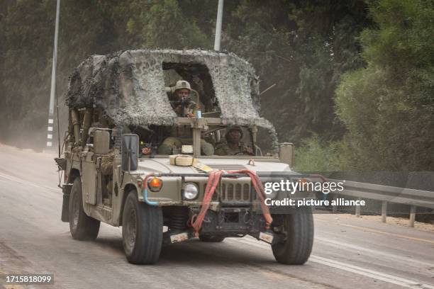 October 2023, Israel, Sa'ad: Israeli forces patrol areas along the Israeli-Gaza border as fighting between Israeli troops and Islamist Hamas...