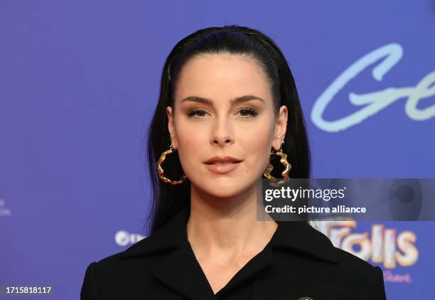 October 2023, North Rhine-Westphalia, Cologne: Singer Lena Meyer-Landrut, the German voice of Poppy, will attend the premiere of the Animaltion film...