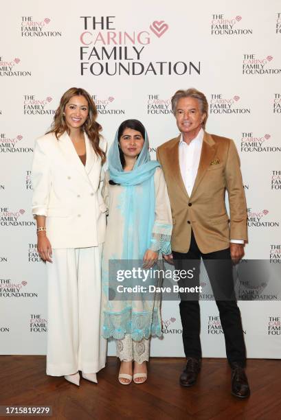 Patricia Caring, Malala Yousafzai and Richard Caring attend Annabel's and The Caring Family Foundation's celebration of International Day Of The Girl...