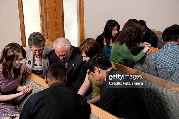 church service group prayer - revival stock pictures, royalty-free photos & images