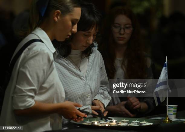 Girls come together at Beth Israel Synagogue in Edmonton tonight, lighting candles to express their community-wide support and solidarity with Israel...