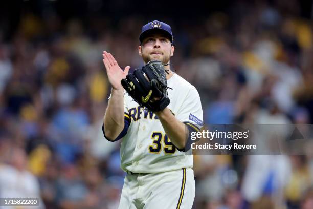 Corbin Burnes of the Milwaukee Brewers reacts after recording a strikeout in the second inning against the Arizona Diamondbacks during Game One of...