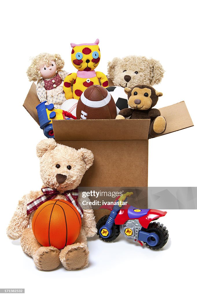 Caixa cheia de brinquedos, doações