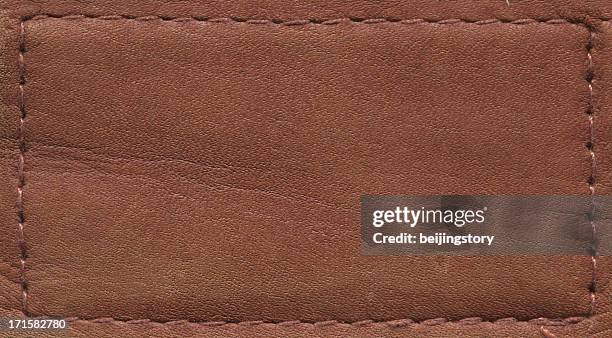 high resolution authentic leather patch - fabric tag stock pictures, royalty-free photos & images