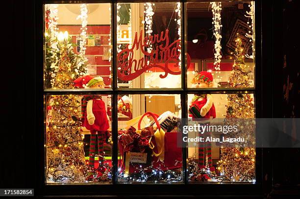 festive christmas holiday window display - retail display stock pictures, royalty-free photos & images