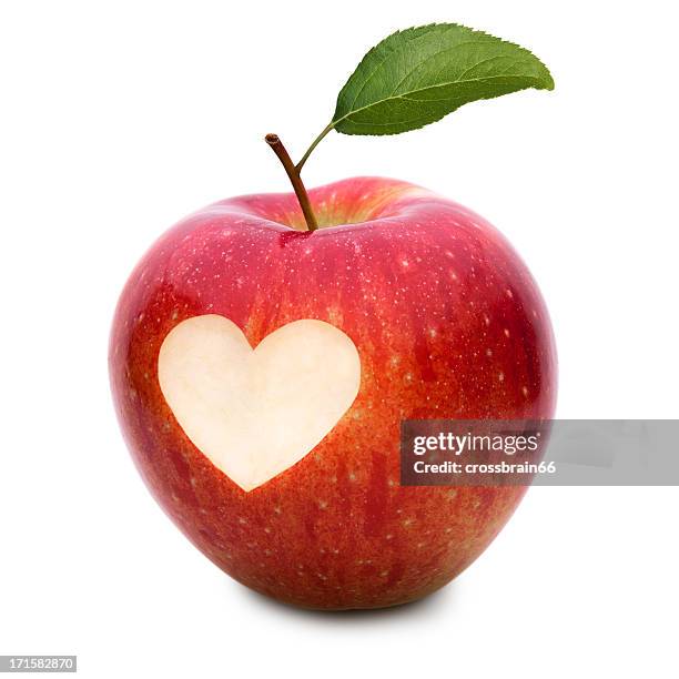 love apple with heart symbol and leaf - apple heart stock pictures, royalty-free photos & images