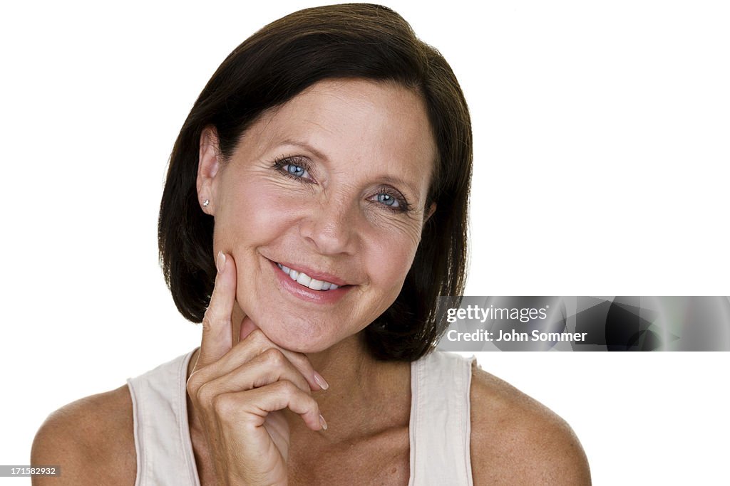 Headshot of a cheerful middle age woman