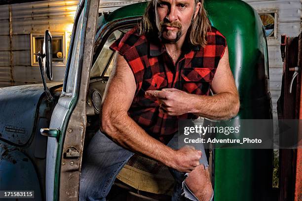 tough guy redneck with mullet - redneck stock pictures, royalty-free photos & images