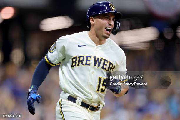 Tyrone Taylor of the Milwaukee Brewers celebrates after hitting a home run in the second inning against the Arizona Diamondbacks during Game One of...