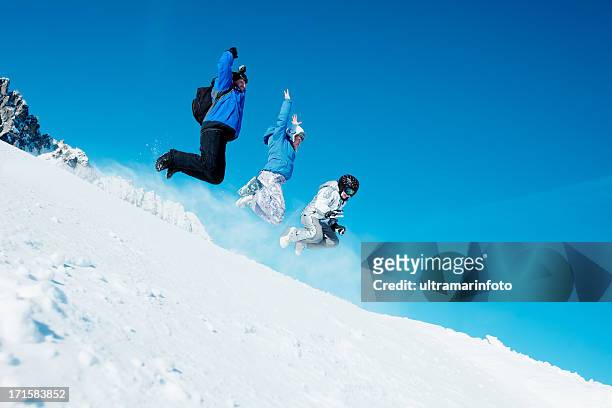 ski-snowboarder team - family in snow mountain stock-fotos und bilder