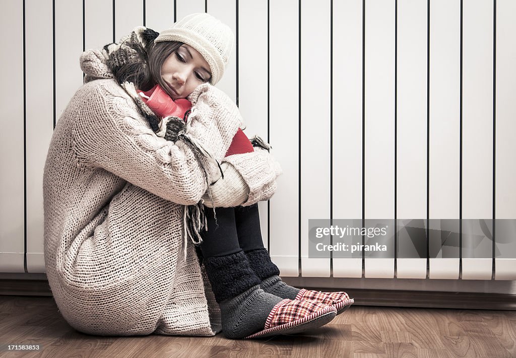 Woman freezing at home