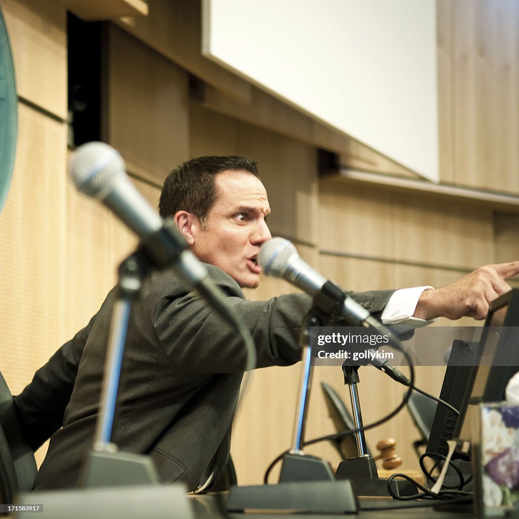 Displeased Politician at auditorium