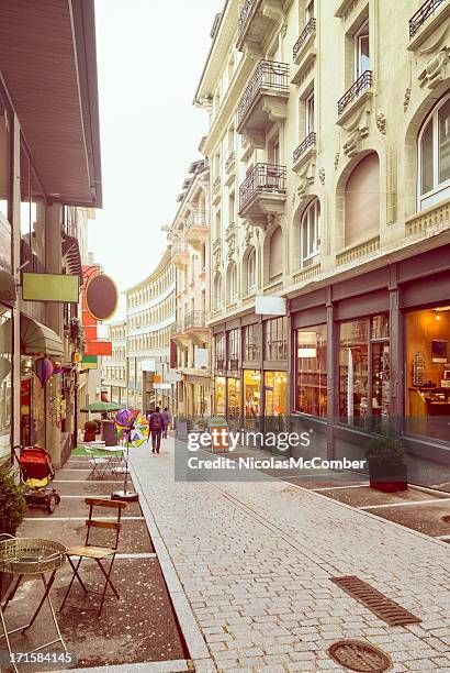 swiss commercial street view vertical - lausanne street stock pictures, royalty-free photos & images