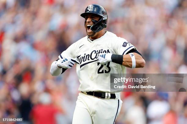 Royce Lewis of the Minnesota Twins celebrates after hitting a two run home run against Kevin Gausman of the Toronto Blue Jays during the first inning...