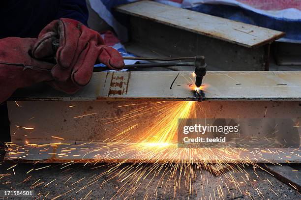 steel metal cutting-oxygen fire slicing tubes with sparks - burst pipes stock pictures, royalty-free photos & images