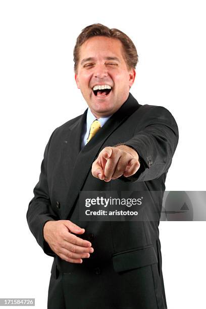 mischievious businessman laughing at you, isolated on white - teasing stock pictures, royalty-free photos & images