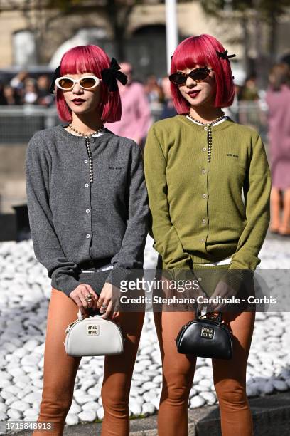 Ami Suzuki and Aya Suzuki of Amiaya attend the Miu Miu Womenswear Spring/Summer 2024 show as part of Paris Fashion Week on October 03, 2023 in Paris,...