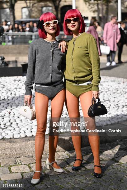 Ami Suzuki and Aya Suzuki of Amiaya attend the Miu Miu Womenswear Spring/Summer 2024 show as part of Paris Fashion Week on October 03, 2023 in Paris,...