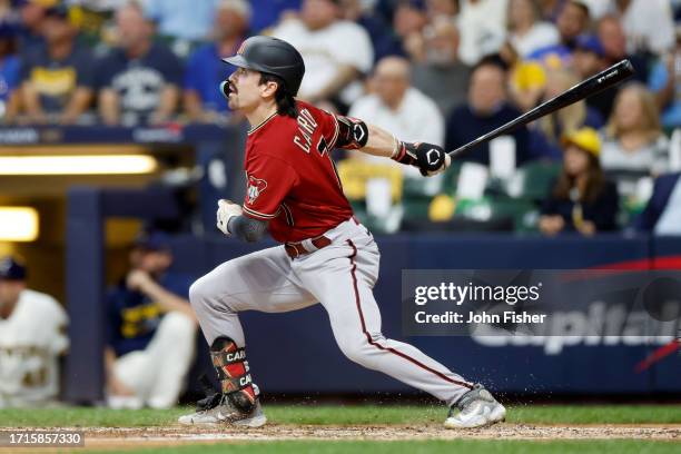 Corbin Carroll of the Arizona Diamondbacks hits a home run in the third inning against the Milwaukee Brewers during Game One of the Wild Card Series...