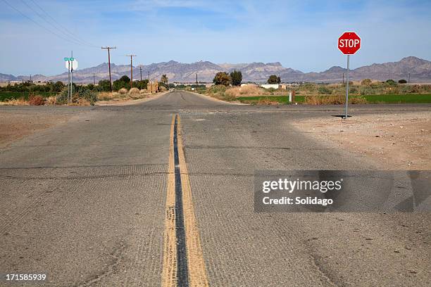 secondary roads crossing rural america - blythe stock pictures, royalty-free photos & images