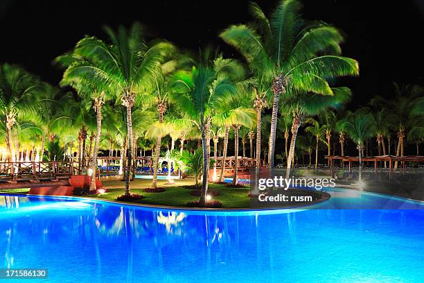 night poolside, yucatan, mexico - aqua star pool stock pictures, royalty-free photos & images