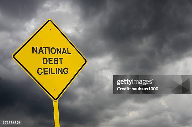 schuldenobergrenze road sign - debt ceiling stock-fotos und bilder