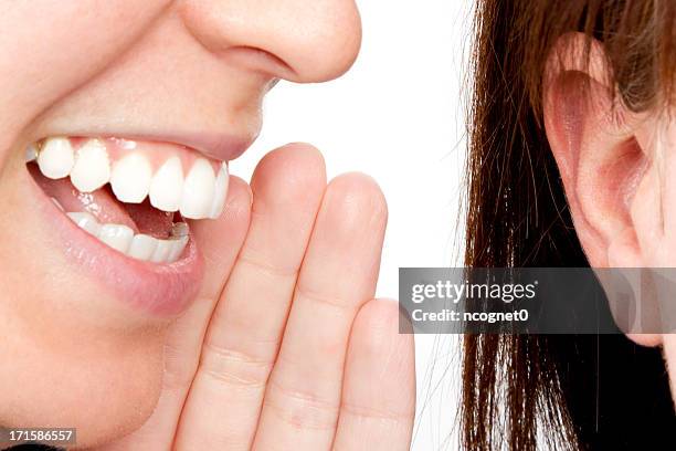 gossip - human ear stock pictures, royalty-free photos & images