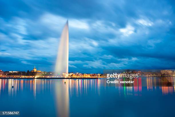 lake geneva jet d'eau and sunset of alps - geneva stock pictures, royalty-free photos & images