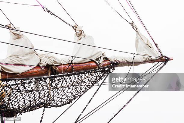 old sailing ship bowsprit against white background, copy space - pulley stock pictures, royalty-free photos & images