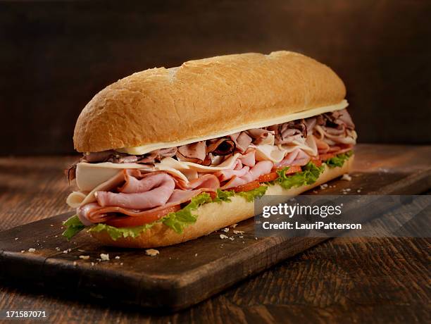 foot long roast beef and cheese sub - submarine stock pictures, royalty-free photos & images