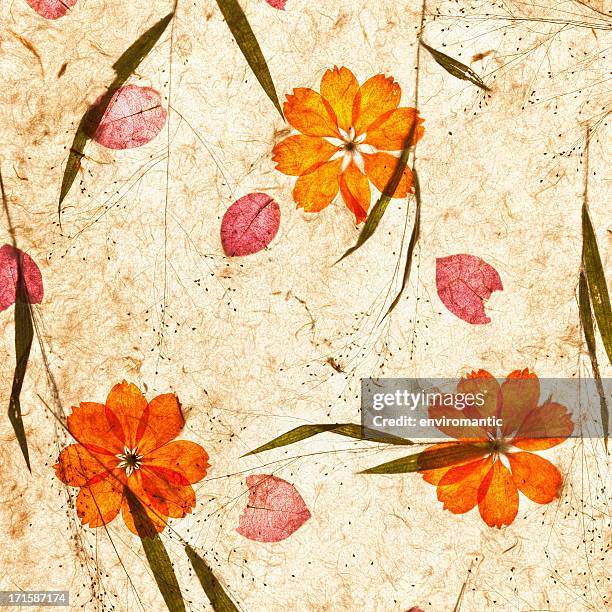 handmade recycled flower and leaf paper background. - mulberry stock pictures, royalty-free photos & images