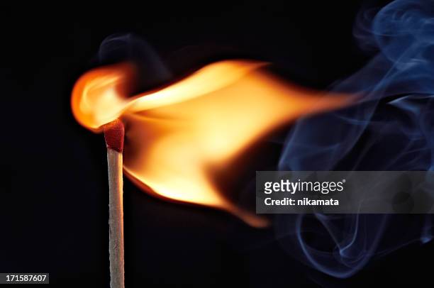 flame from a lit match - ontsteking stockfoto's en -beelden